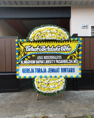 Papan Bunga Duka di Lere